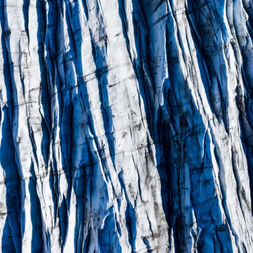 The shape, crevasses and curves of a glacier, as you can see it from the air, always speak to my imagination. I just love these patterns and textures. This shot is a 3-shot vertical panorama stitched together to get a good glimpse of it.