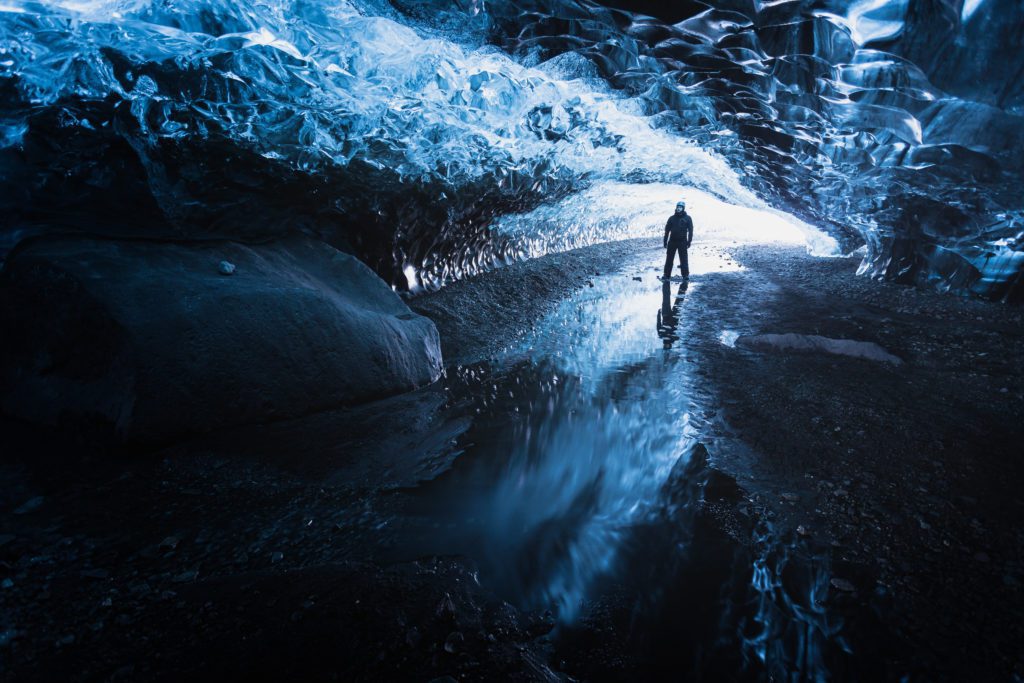A crystal blue ice cave underneath Vatnajökull in South East Iceland.