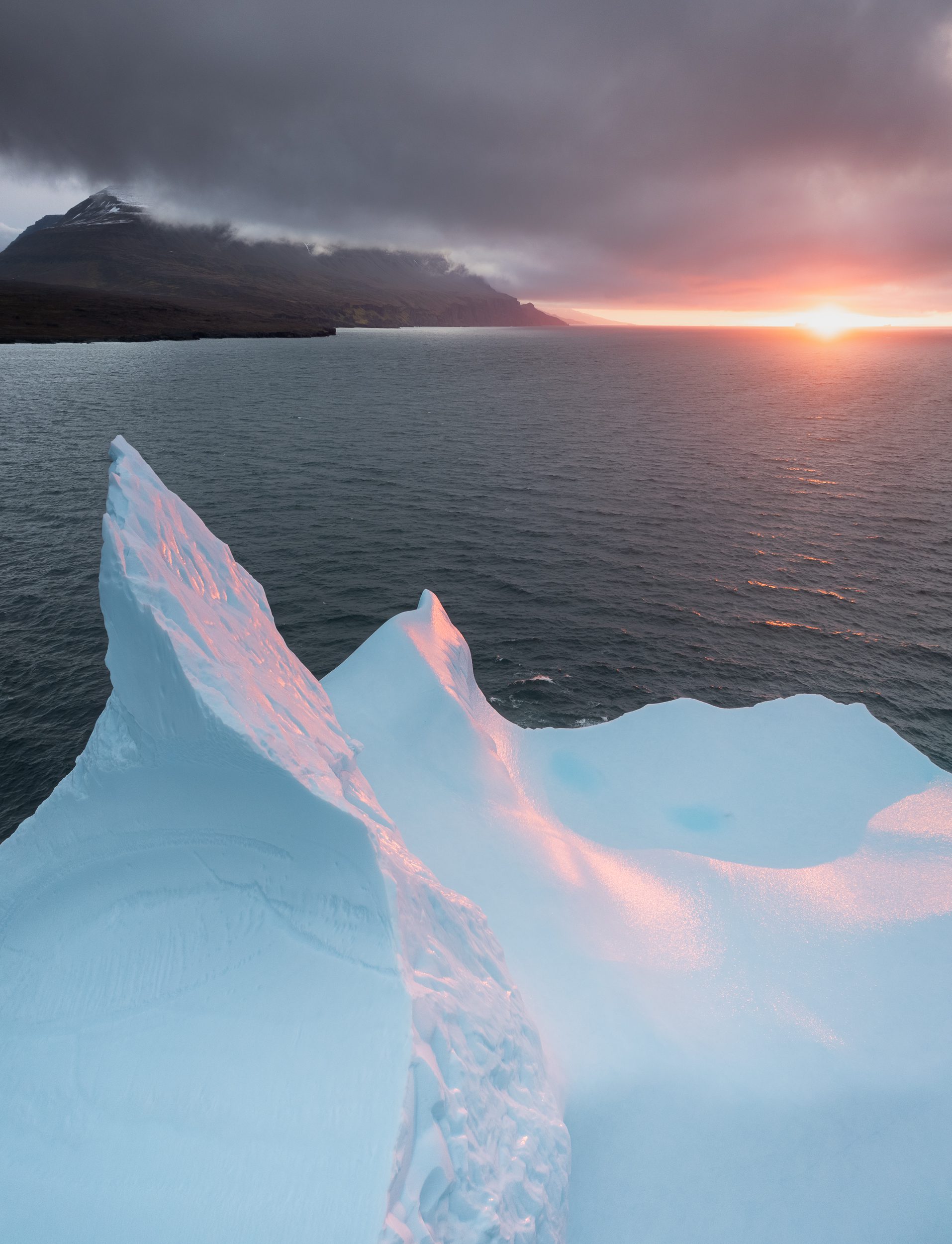 Floating iceberg during sunset at Disko Island, Greenland