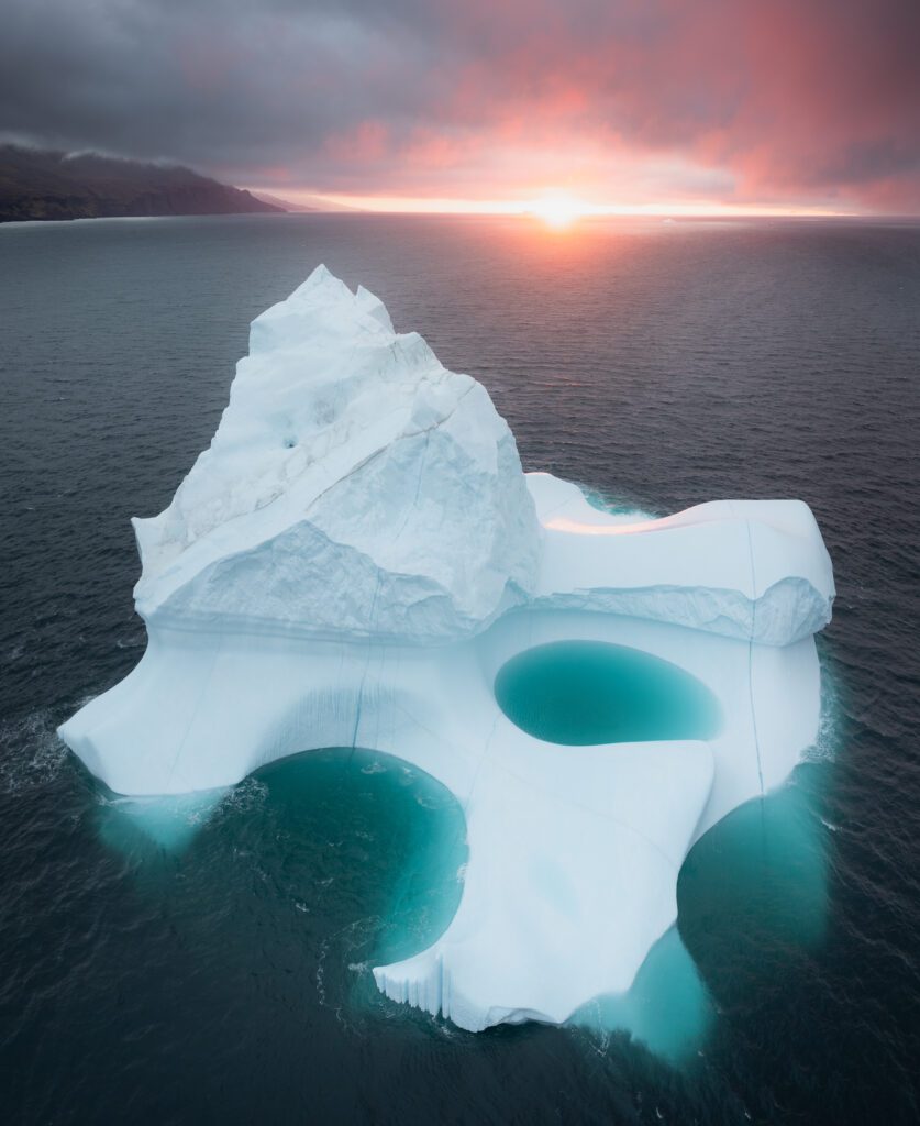 Floating iceberg during sunset at Disko Island, Greenland