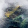Braided rivers in Iceland engulfed by low clouds