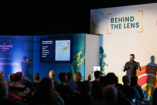 Wide view of Jeroen Van Nieuwenhove presenting Svartsengi volcano content at The Photography Show 2026.